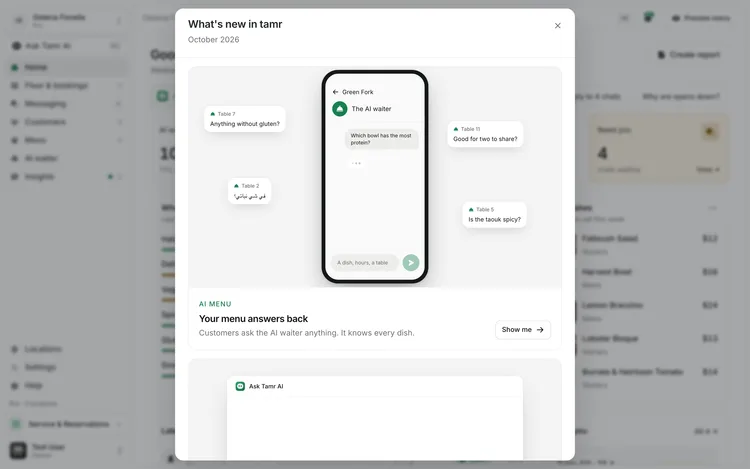 The What's new in tamr dialog for October 2026, opening on AI menu: Your menu answers back, with an animated phone of the AI waiter and a Show me button